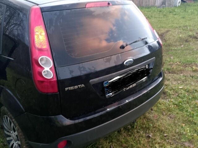 Черный Форд Фиеста, объемом двигателя 1.3 л и пробегом 230 тыс. км за 2500 $, фото 5 на Automoto.ua