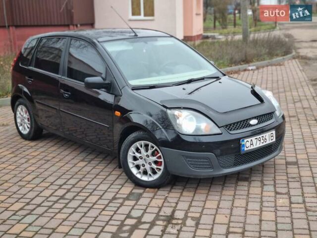Черный Форд Фиеста, объемом двигателя 1.4 л и пробегом 233 тыс. км за 4650 $, фото 7 на Automoto.ua