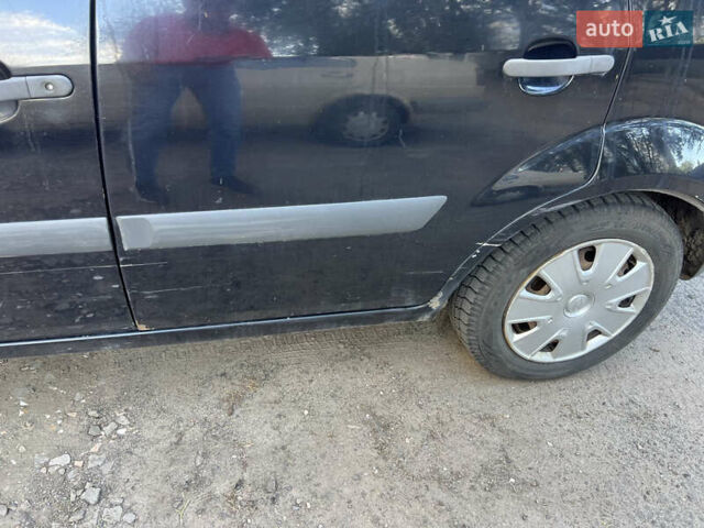 Черный Форд Фиеста, объемом двигателя 1.25 л и пробегом 140 тыс. км за 2800 $, фото 3 на Automoto.ua