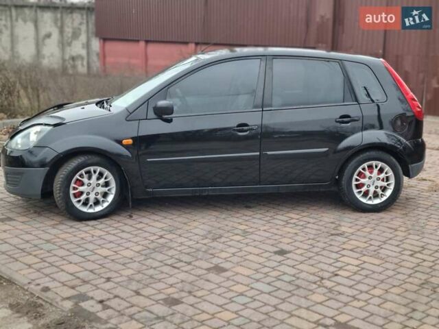 Черный Форд Фиеста, объемом двигателя 1.4 л и пробегом 233 тыс. км за 4650 $, фото 2 на Automoto.ua