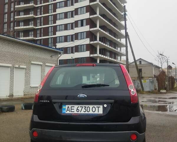 Черный Форд Фиеста, объемом двигателя 1.39 л и пробегом 247 тыс. км за 3000 $, фото 4 на Automoto.ua