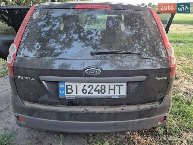 Черный Форд Фиеста, объемом двигателя 1.39 л и пробегом 231 тыс. км за 3900 $, фото 21 на Automoto.ua