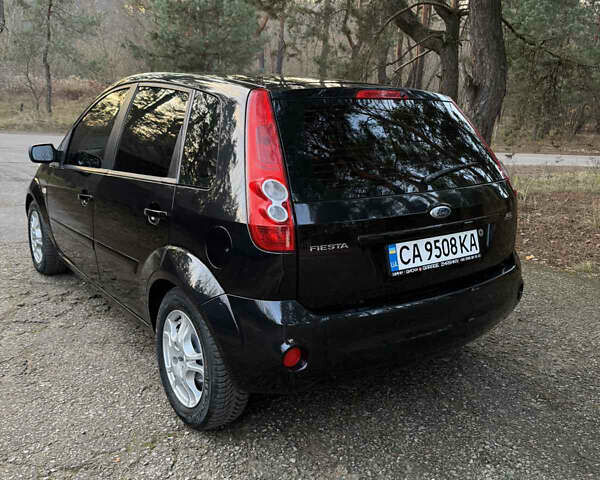 Черный Форд Фиеста, объемом двигателя 1.3 л и пробегом 276 тыс. км за 4300 $, фото 13 на Automoto.ua