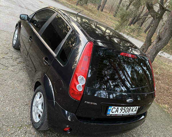 Черный Форд Фиеста, объемом двигателя 1.3 л и пробегом 276 тыс. км за 4300 $, фото 26 на Automoto.ua