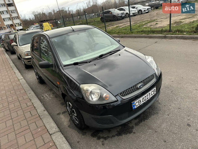 Черный Форд Фиеста, объемом двигателя 1.4 л и пробегом 145 тыс. км за 4000 $, фото 3 на Automoto.ua