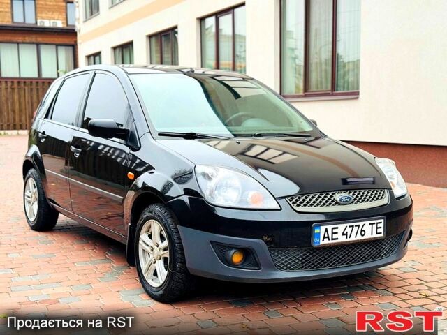 Черный Форд Фиеста, объемом двигателя 1.2 л и пробегом 160 тыс. км за 3999 $, фото 2 на Automoto.ua