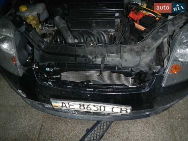 Черный Форд Фиеста, объемом двигателя 1.25 л и пробегом 220 тыс. км за 1600 $, фото 3 на Automoto.ua