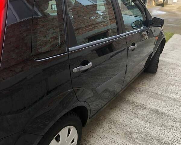 Черный Форд Фиеста, объемом двигателя 1.39 л и пробегом 234 тыс. км за 4400 $, фото 3 на Automoto.ua