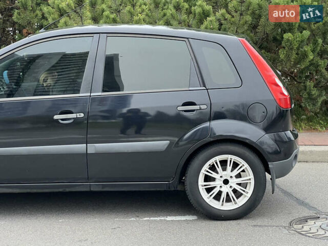 Черный Форд Фиеста, объемом двигателя 1.3 л и пробегом 251 тыс. км за 3500 $, фото 12 на Automoto.ua