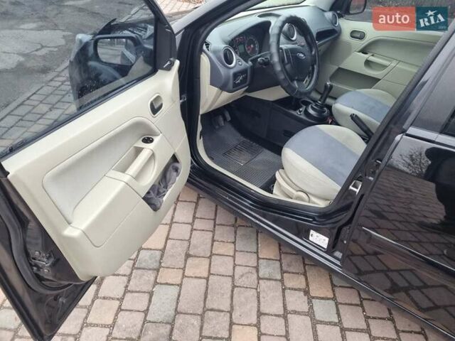 Черный Форд Фиеста, объемом двигателя 1.4 л и пробегом 233 тыс. км за 4650 $, фото 10 на Automoto.ua