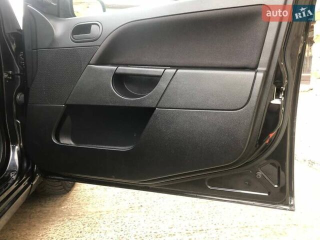 Черный Форд Фиеста, объемом двигателя 1.39 л и пробегом 234 тыс. км за 4400 $, фото 9 на Automoto.ua