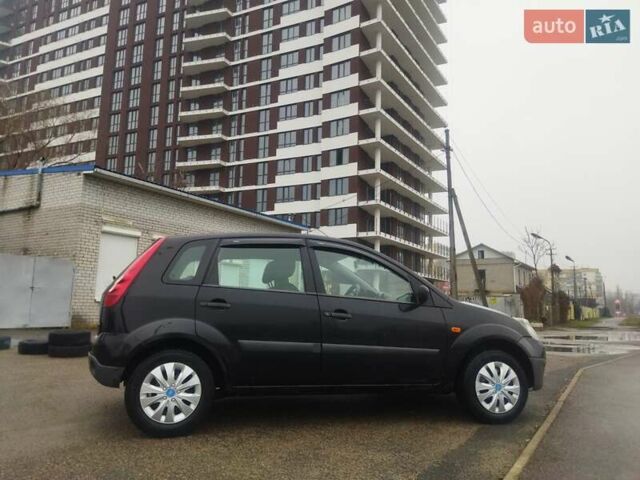 Черный Форд Фиеста, объемом двигателя 1.39 л и пробегом 247 тыс. км за 3000 $, фото 6 на Automoto.ua