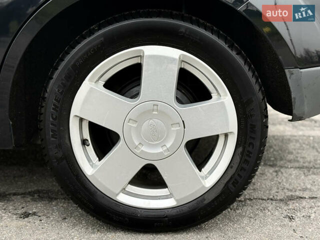 Черный Форд Фиеста, объемом двигателя 1.39 л и пробегом 112 тыс. км за 5899 $, фото 9 на Automoto.ua