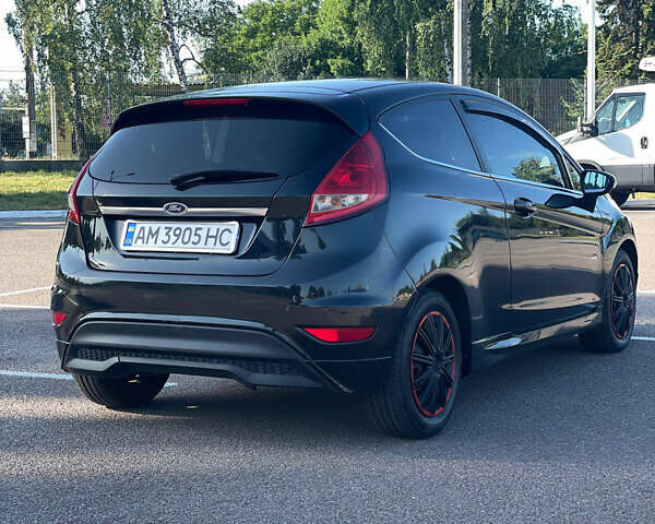 Черный Форд Фиеста, объемом двигателя 1.4 л и пробегом 148 тыс. км за 4399 $, фото 6 на Automoto.ua