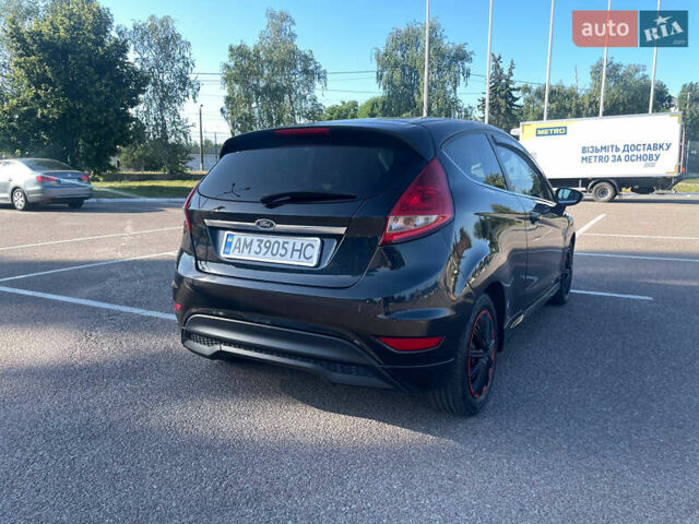 Черный Форд Фиеста, объемом двигателя 1.4 л и пробегом 148 тыс. км за 4399 $, фото 1 на Automoto.ua