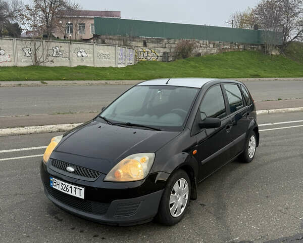 Черный Форд Фиеста, объемом двигателя 1.25 л и пробегом 116 тыс. км за 3800 $, фото 6 на Automoto.ua