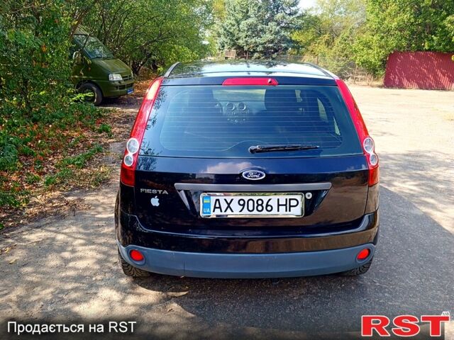 Черный Форд Фиеста, объемом двигателя 1.4 л и пробегом 154 тыс. км за 5100 $, фото 1 на Automoto.ua