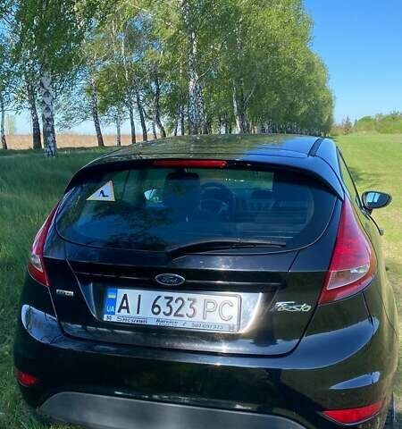 Черный Форд Фиеста, объемом двигателя 1.4 л и пробегом 149 тыс. км за 5700 $, фото 24 на Automoto.ua