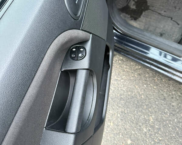 Черный Форд Фиеста, объемом двигателя 1.25 л и пробегом 116 тыс. км за 3800 $, фото 12 на Automoto.ua