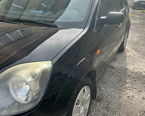 Черный Форд Фиеста, объемом двигателя 1.24 л и пробегом 159 тыс. км за 5500 $, фото 6 на Automoto.ua