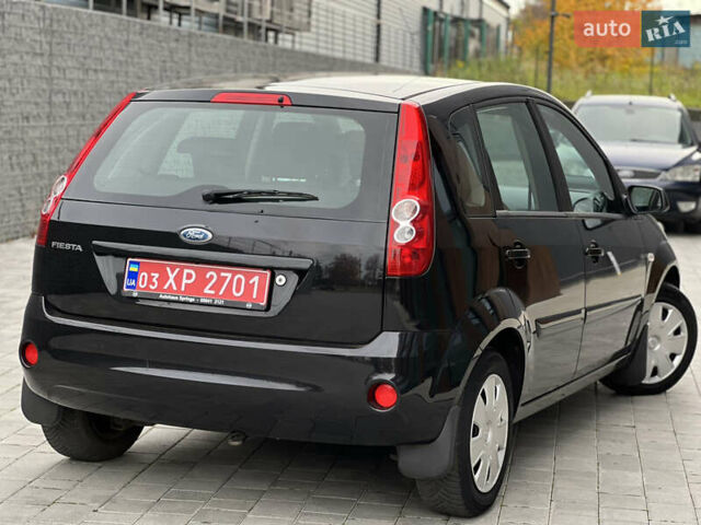 Черный Форд Фиеста, объемом двигателя 1.4 л и пробегом 184 тыс. км за 4750 $, фото 16 на Automoto.ua