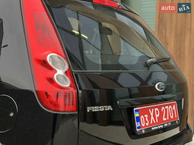 Черный Форд Фиеста, объемом двигателя 1.4 л и пробегом 184 тыс. км за 4750 $, фото 12 на Automoto.ua
