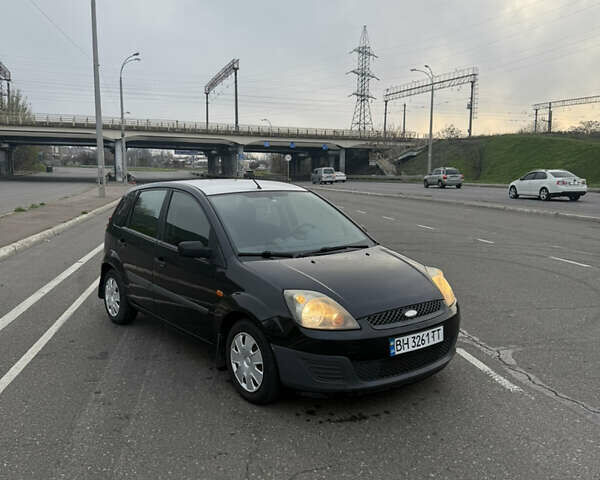 Черный Форд Фиеста, объемом двигателя 1.25 л и пробегом 116 тыс. км за 3800 $, фото 1 на Automoto.ua