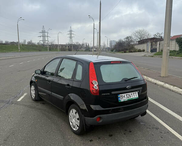 Черный Форд Фиеста, объемом двигателя 1.25 л и пробегом 116 тыс. км за 3800 $, фото 4 на Automoto.ua