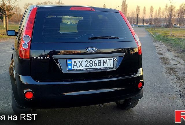 Черный Форд Фиеста, объемом двигателя 1.4 л и пробегом 137 тыс. км за 4399 $, фото 1 на Automoto.ua