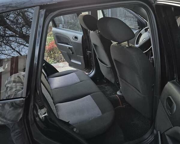 Чорний Форд Фієста, об'ємом двигуна 1.39 л та пробігом 148 тис. км за 4400 $, фото 10 на Automoto.ua