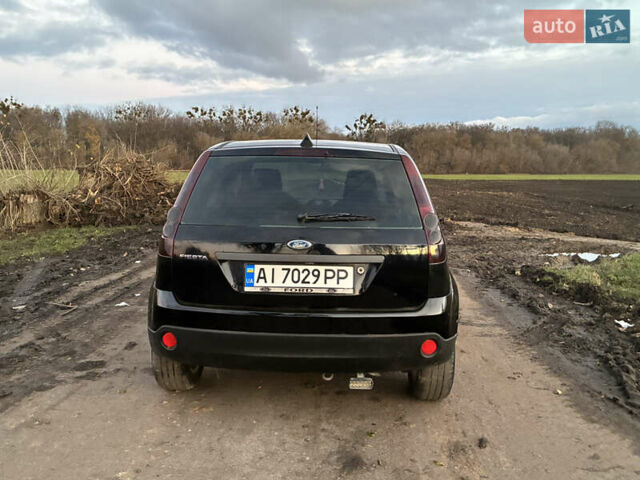 Чорний Форд Фієста, об'ємом двигуна 1.4 л та пробігом 270 тис. км за 3600 $, фото 5 на Automoto.ua