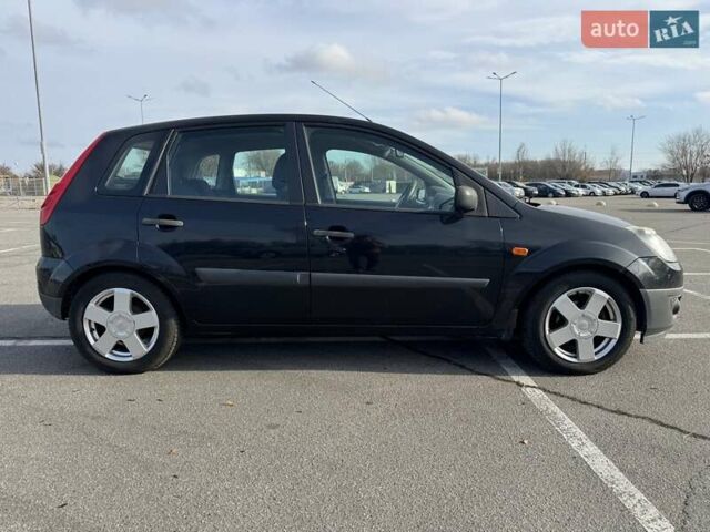 Черный Форд Фиеста, объемом двигателя 1.4 л и пробегом 117 тыс. км за 4500 $, фото 5 на Automoto.ua