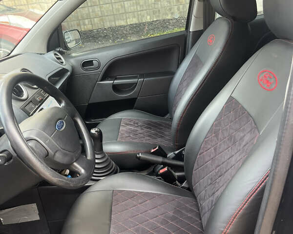 Черный Форд Фиеста, объемом двигателя 1.24 л и пробегом 159 тыс. км за 5500 $, фото 11 на Automoto.ua