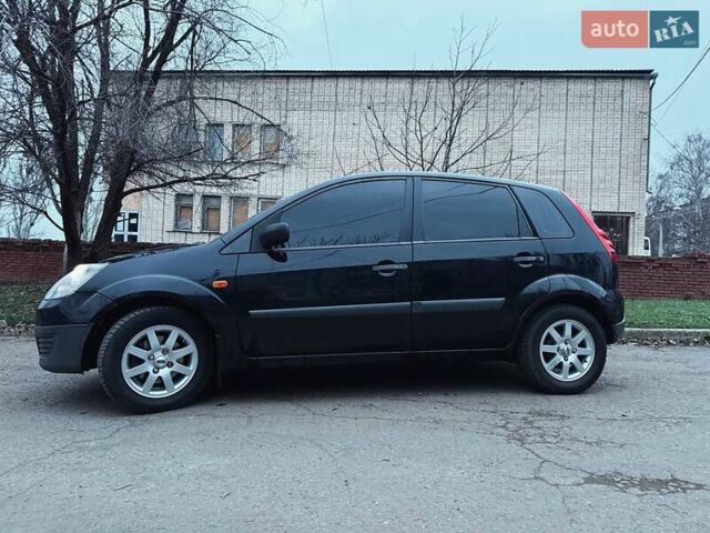 Чорний Форд Фієста, об'ємом двигуна 1.25 л та пробігом 246 тис. км за 4300 $, фото 4 на Automoto.ua
