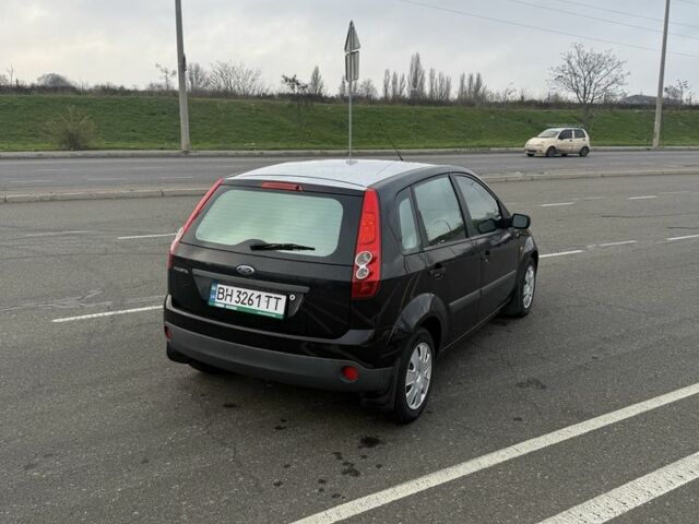 Черный Форд Фиеста, объемом двигателя 1.2 л и пробегом 116 тыс. км за 3800 $, фото 3 на Automoto.ua