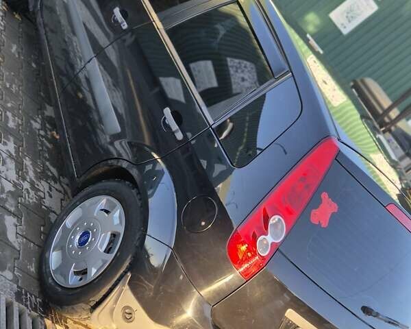 Чорний Форд Фієста, об'ємом двигуна 1.39 л та пробігом 148 тис. км за 4400 $, фото 3 на Automoto.ua