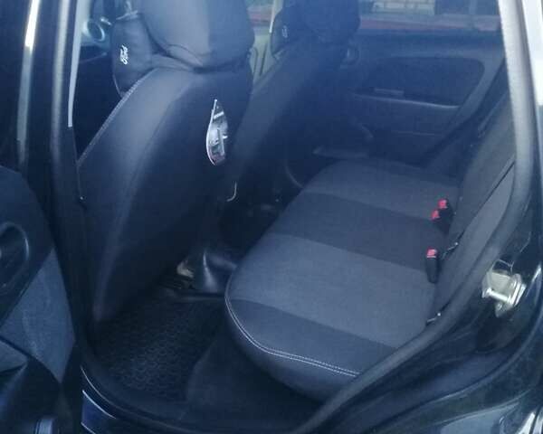 Черный Форд Фиеста, объемом двигателя 1.4 л и пробегом 204 тыс. км за 3900 $, фото 7 на Automoto.ua