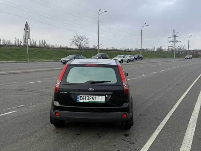 Черный Форд Фиеста, объемом двигателя 1.2 л и пробегом 116 тыс. км за 3800 $, фото 4 на Automoto.ua