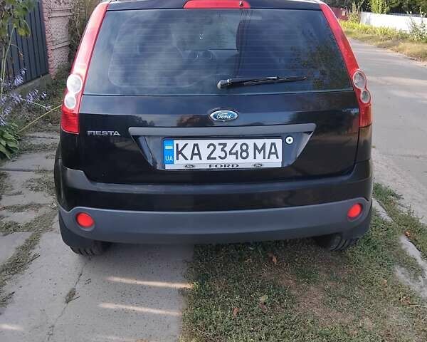 Черный Форд Фиеста, объемом двигателя 1.39 л и пробегом 136 тыс. км за 3900 $, фото 14 на Automoto.ua