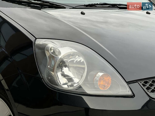 Черный Форд Фиеста, объемом двигателя 1.4 л и пробегом 184 тыс. км за 4750 $, фото 5 на Automoto.ua