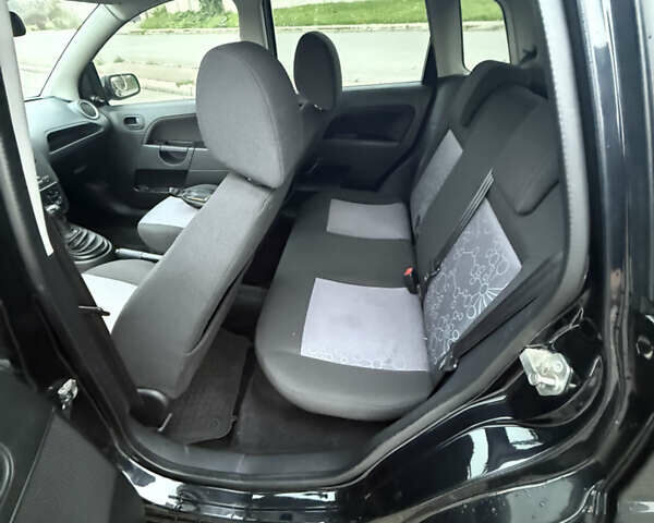 Черный Форд Фиеста, объемом двигателя 1.25 л и пробегом 116 тыс. км за 3800 $, фото 10 на Automoto.ua