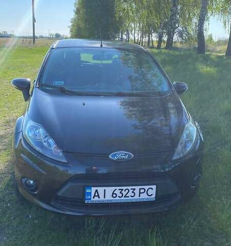 Черный Форд Фиеста, объемом двигателя 1.4 л и пробегом 149 тыс. км за 5700 $, фото 11 на Automoto.ua