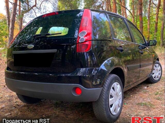 Черный Форд Фиеста, объемом двигателя 1.4 л и пробегом 200 тыс. км за 3800 $, фото 1 на Automoto.ua