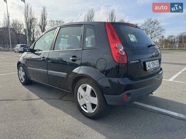 Черный Форд Фиеста, объемом двигателя 1.4 л и пробегом 117 тыс. км за 4500 $, фото 2 на Automoto.ua