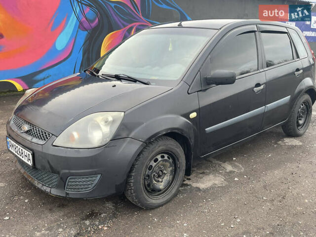 Черный Форд Фиеста, объемом двигателя 1.39 л и пробегом 337 тыс. км за 2600 $, фото 6 на Automoto.ua