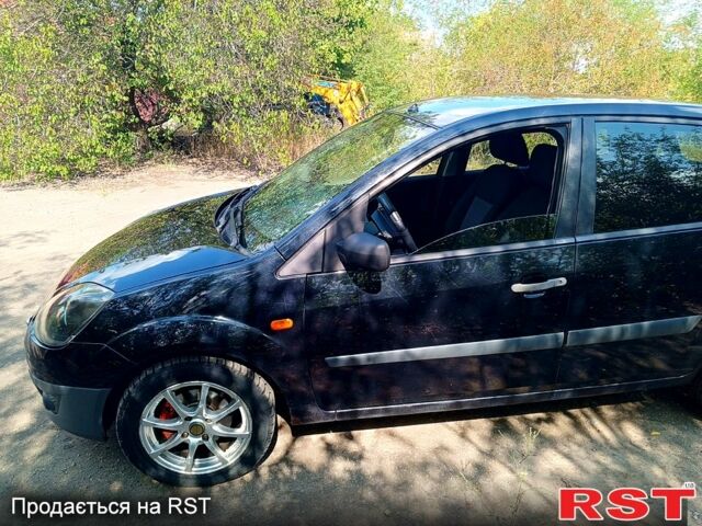 Черный Форд Фиеста, объемом двигателя 1.4 л и пробегом 154 тыс. км за 5100 $, фото 6 на Automoto.ua