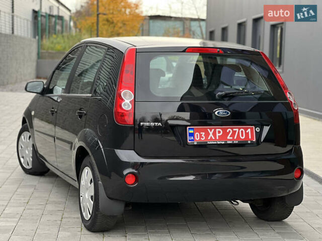 Черный Форд Фиеста, объемом двигателя 1.4 л и пробегом 184 тыс. км за 4750 $, фото 8 на Automoto.ua