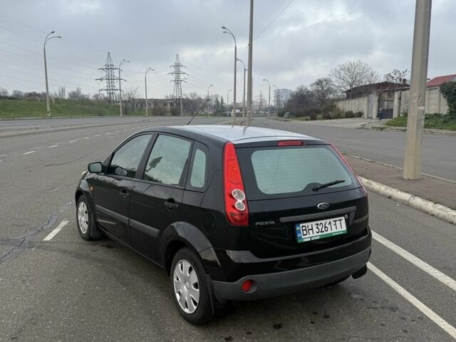 Черный Форд Фиеста, объемом двигателя 1.2 л и пробегом 116 тыс. км за 3800 $, фото 5 на Automoto.ua