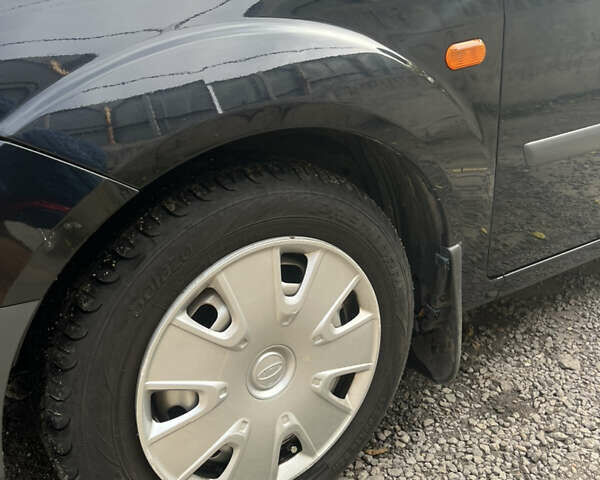 Черный Форд Фиеста, объемом двигателя 1.24 л и пробегом 159 тыс. км за 5500 $, фото 8 на Automoto.ua