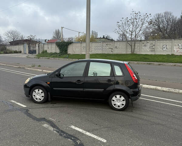 Черный Форд Фиеста, объемом двигателя 1.25 л и пробегом 116 тыс. км за 3800 $, фото 5 на Automoto.ua